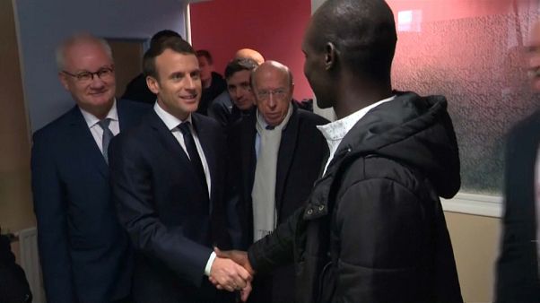 French president Emmanuel Macron meets African migrant in Calais French president Emmanuel Macron meets African migrant in Calais