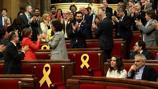 Catalan parliament holds first meeting, voting in separatist MP as speaker 