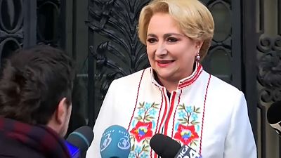Romania names first female PM 