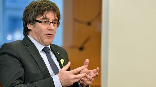 Former Catalan president Carles Puigdemont attends an interview with Reuter