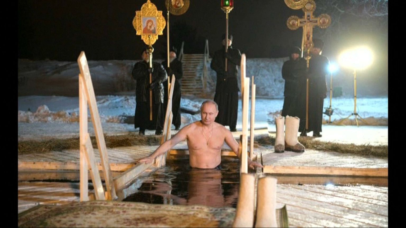 Russian President Vladimir Putin takes an icy dip to mark Epiphany