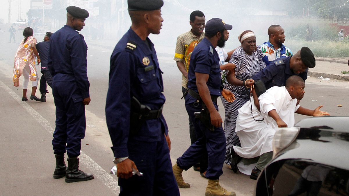 Police fire tear gas to disperse protesters in Kinshasa