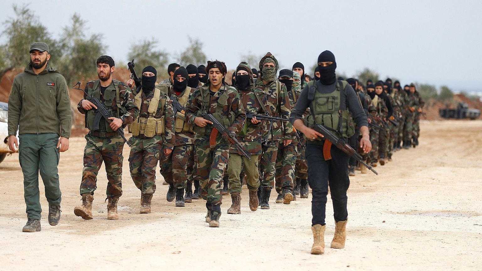 Turkey-backed Free Syrian Army fighters are seen at a training camp in Azaz