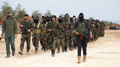 Turkey-backed Free Syrian Army fighters are seen at a training camp in Azaz