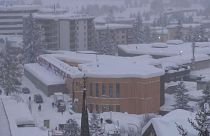 World Economic Forum in Davos battles snow... and awaits Trump
