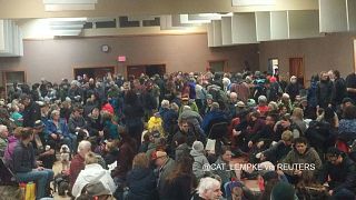 People wait at Tofino, British Columbia, Canada during the tsunami alert