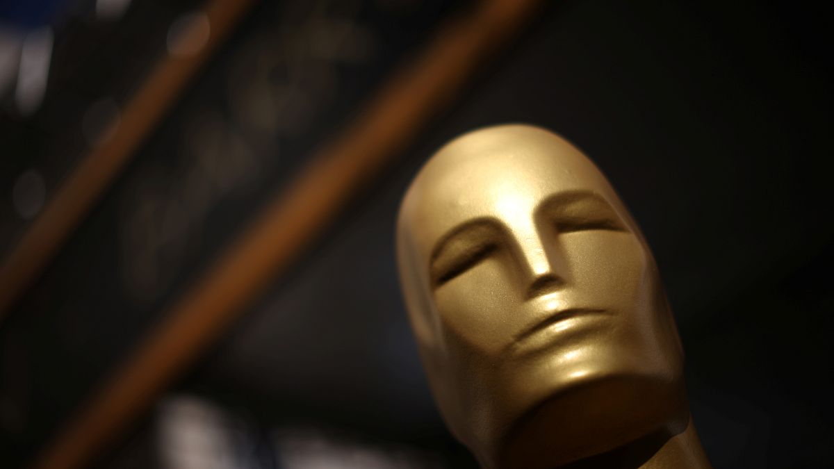 An Oscar statue is seen outside the Dolby Theatre as preparations continue 