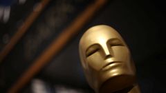 An Oscar statue is seen outside the Dolby Theatre as preparations continue 
