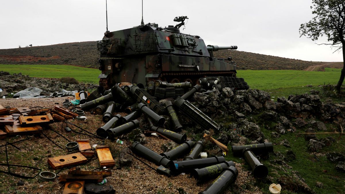 Empty shells are seen next to a Turkish army