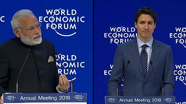 Modi and Trudeau defend free trade at Davos