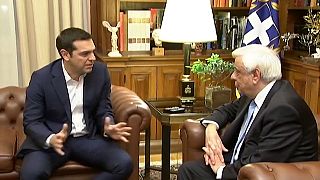 Greek prime minister Alexis Tsipras (L) and president Prokopis Pavlopoulos