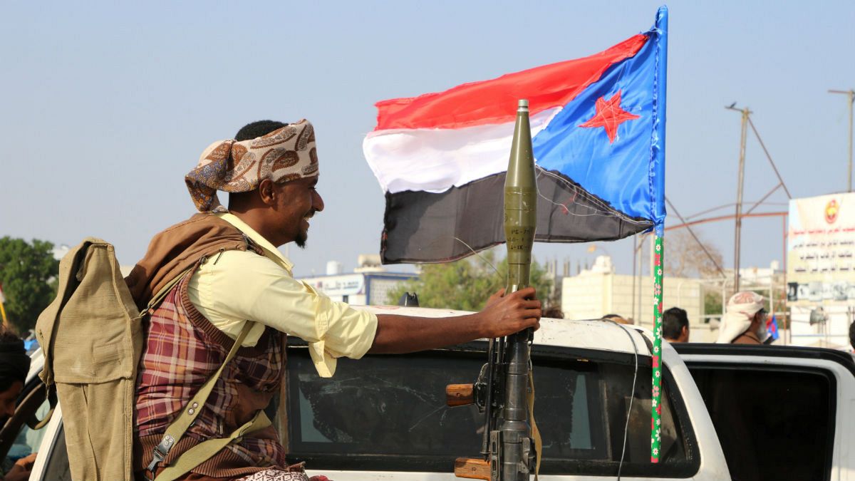Bodyguard of a southern Yemeni separatist leader holds an RPG launcher 