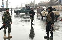 Afghan security forces stand near the Marshal Fahim military academy