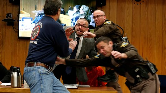 Randall Margraves lunges at Larry Nassar in the courtroom.