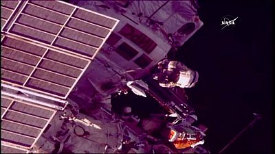 Russian astronauts go for spacewalk