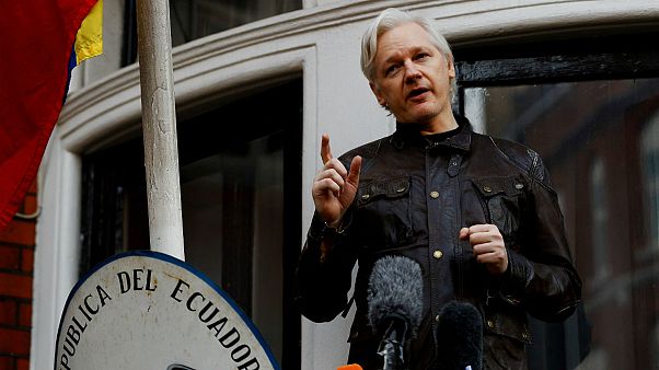 FILE PHOTO: WikiLeaks founder Julian Assange is seen on the balcony of the FILE PHOTO: WikiLeaks founder Julian Assange is seen on the balcony of the