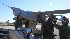 U.S Soldiers mount a drone