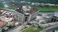 Dozens may remain trapped in the tilted Yun Tsui building.