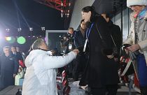 Winter Olympics kicks off with historic handshake