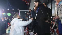 Winter Olympics kicks off with historic handshake