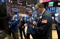 Wall Street recovered some ground on Friday after huge losses previously