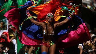 A reveller during Carnival festivities in Rio de Janeiro, Brazil, Feb. 9