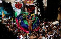 Revellers take part in the annual block party known as "Carmelitas, Rio