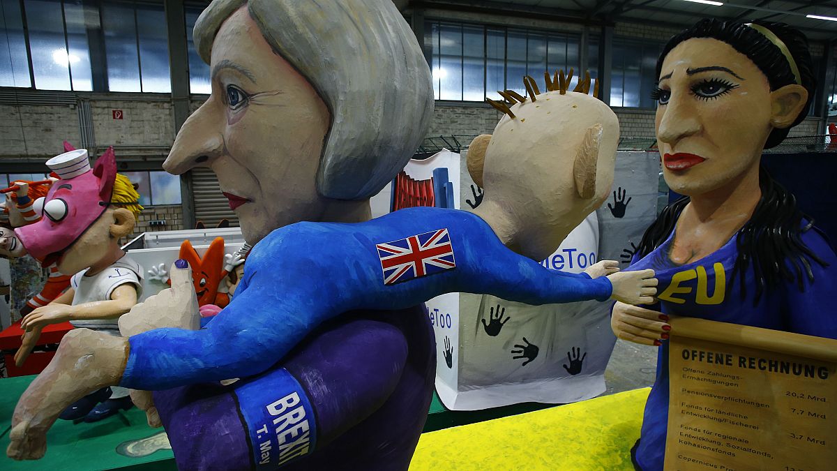 Satirical floats feature Kim Jong Un, Merkel, and Brexit at Cologne Carnival