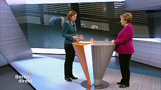 Merkel defends coalition deal on German TV
