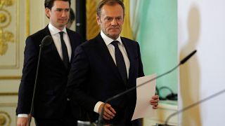 Sebastian Kurz (L) and Donald Tusk arrive for a media statement in Vienna
