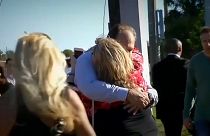 Estudantes reunidos com as suas famílias