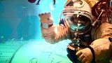 How do you learn to spacewalk?