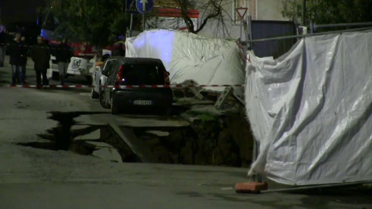 Giant sinkhole opens in Rome, swallowing seven cars