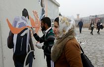 نقش صلح و امید بر دیوارهای کابل