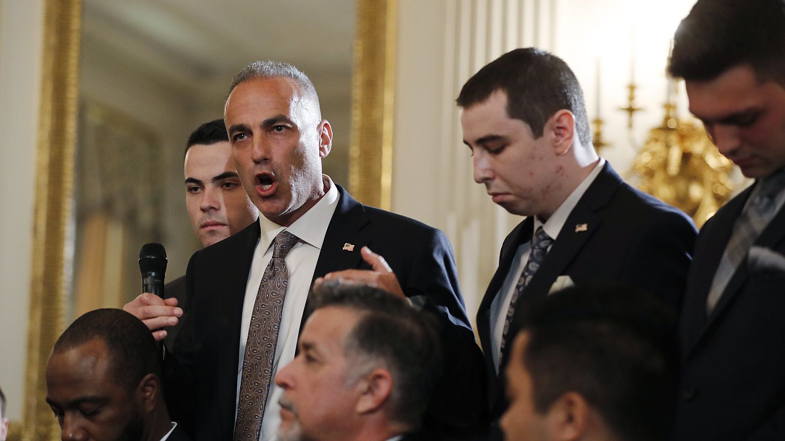 Strong emotions as Florida shooting families meet Trump