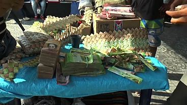 Venezuelanos criam uma moeda de arte Venezuelanos criam uma moeda de arte