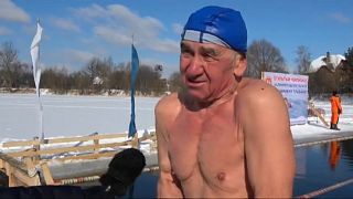Russian ice swimmers brave -10C temperatures