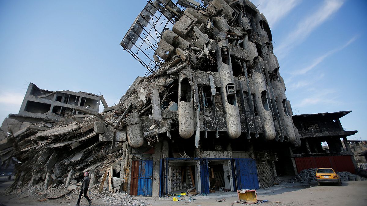 Здание в иракском Мосуле, разрушенное в результате бомбардировок