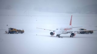 Geneva Airport resumes partial operations after snow forced closure