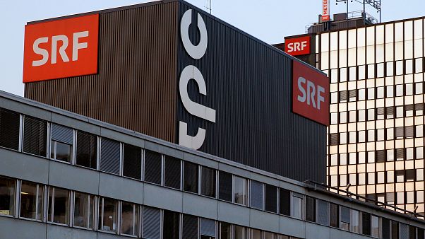 Swiss citizens vote on axing TV licence Swiss citizens vote on axing TV licence