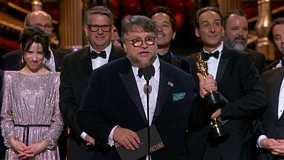 Guillermo del Toro gladly accepts his best director award Guillermo del Toro gladly accepts his best director award