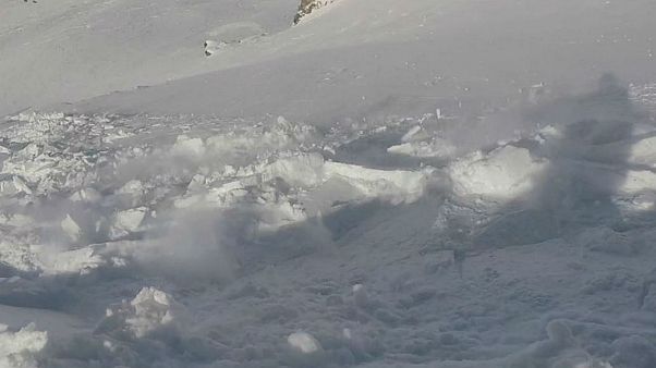 Watch: Snowboarder films the moment he gets caught in avalanche Watch: Snowboarder films the moment he gets caught in avalanche