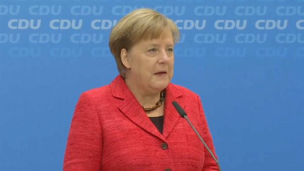 Angela Merkel promet "une voix forte" à l'Allemagne Angela Merkel promet "une voix forte" à l'Allemagne