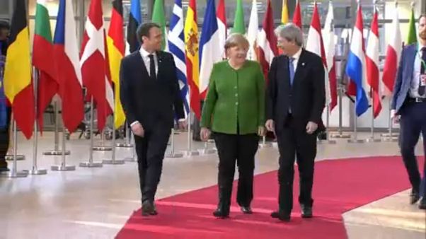 Macron, Merkel e Gentiloni Macron, Merkel e Gentiloni