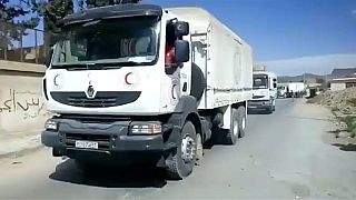 Aid finally arrives in the besieged Syrian enclave of Ghouta 