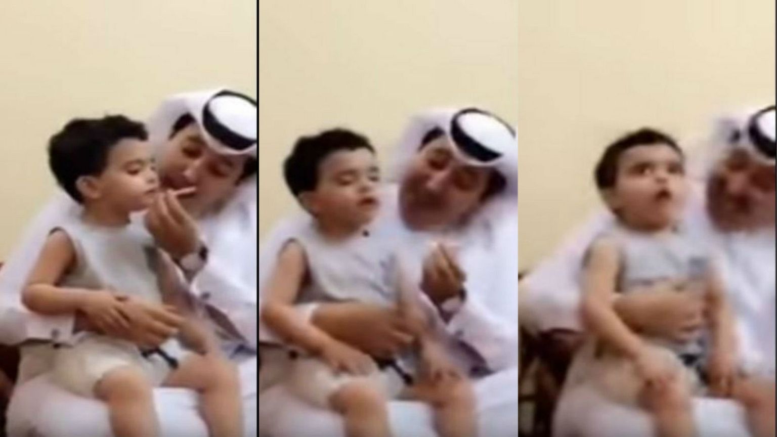 رجل يجبر طفلا على التدخين 
