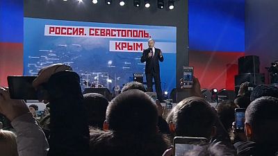 Putin shows his dominance ahead of election