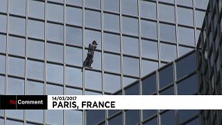 French climber Alain Robert scales skyscraper in Paris business district