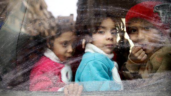 Crianças evacuadas de Ghouta Oriental (13 de março) Crianças evacuadas de Ghouta Oriental (13 de março)