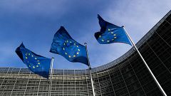 European Union flags outside the EU Commission headquarters in Brussels
